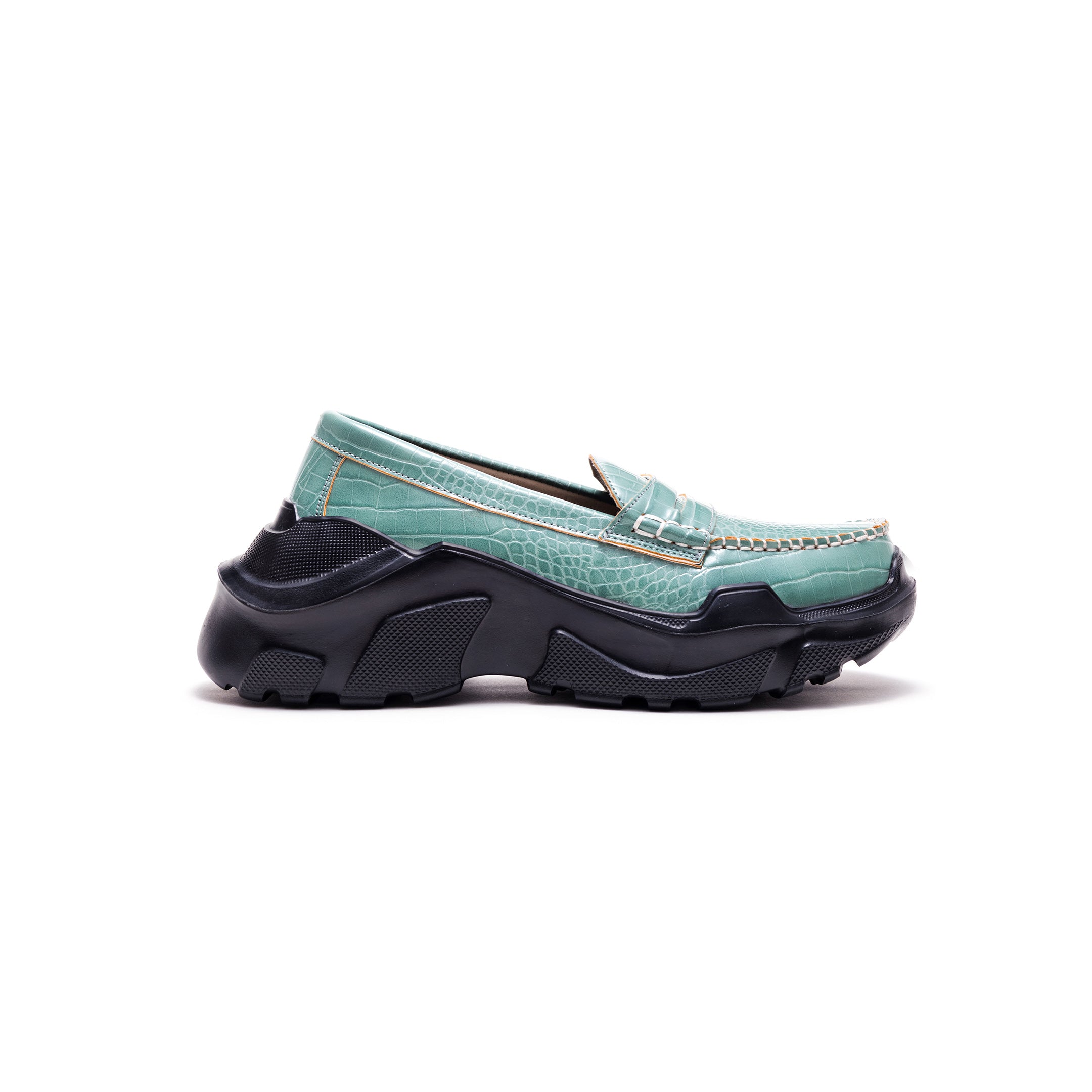 Regulated Gravity-crocodile textured pattern emerald