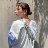 OUTLAND CROSS BODY BAG